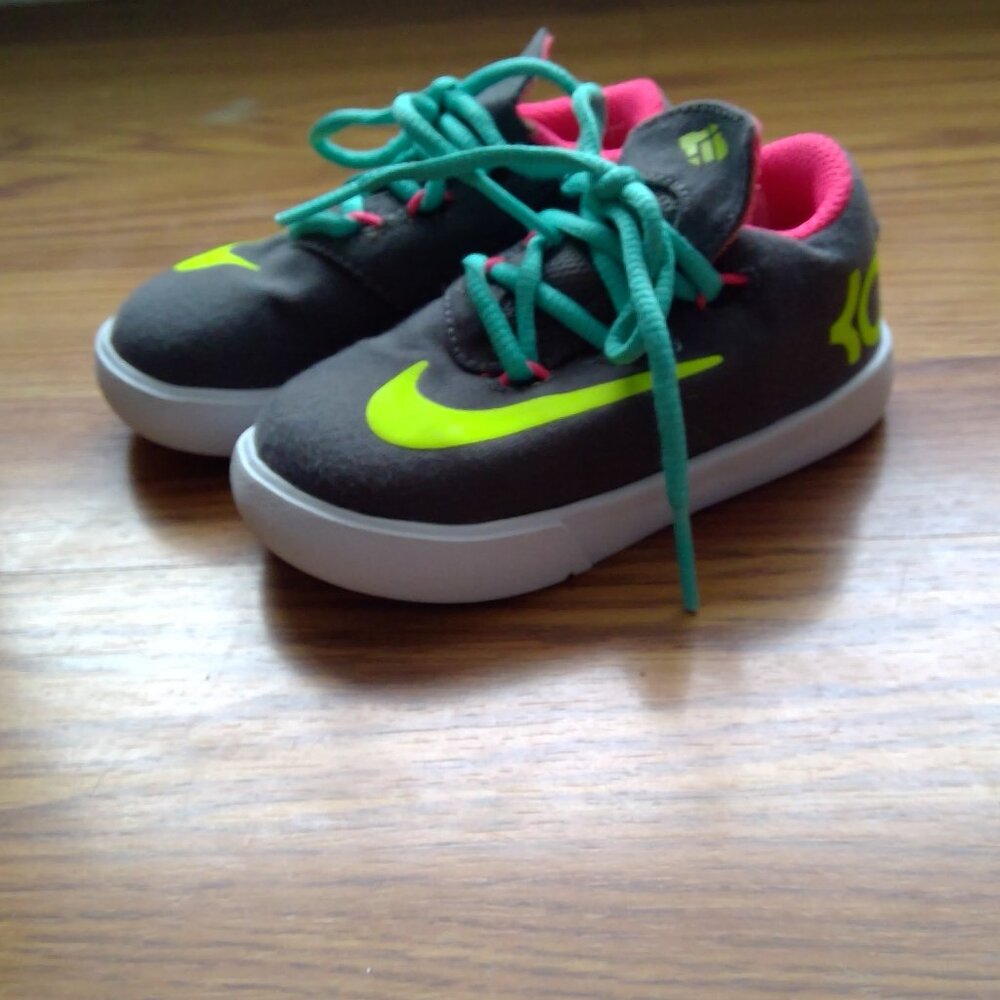Nike Kids Dark Gray Sneakers with Neon Yellow Swoosh and Teal Laces